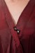 Detail of front snap on Gina - Our Iridescent Polyblend Wraparound Kimono in Burgundy