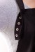 Detail of adjustable neck snaps on Ava - our Iridescent Polyblend Apron in Black