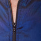 Detail of zipper on  royal blue zip front salon smock