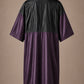 Eggplant iridescent snap-front salon robe back view with black waterproof upper-back panel