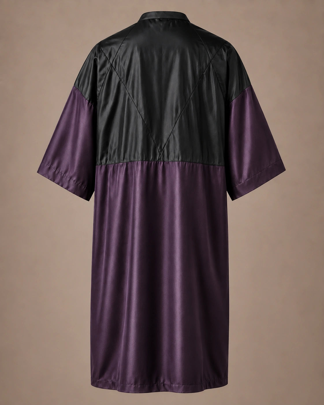 Eggplant iridescent snap-front salon robe back view with black waterproof upper-back panel