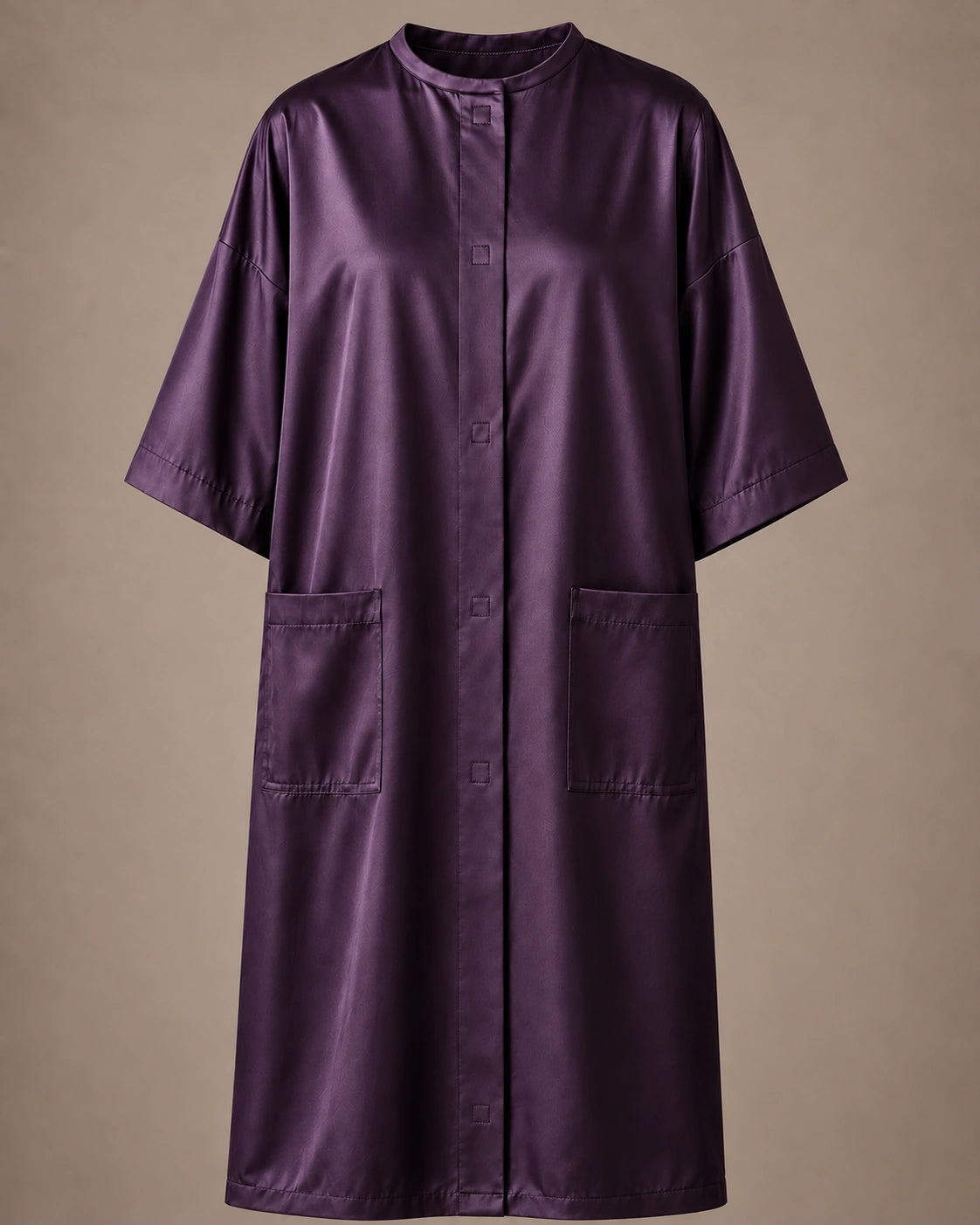 Eggplant iridescent snap-front salon robe front view with black collar trim, short sleeves and front pockets