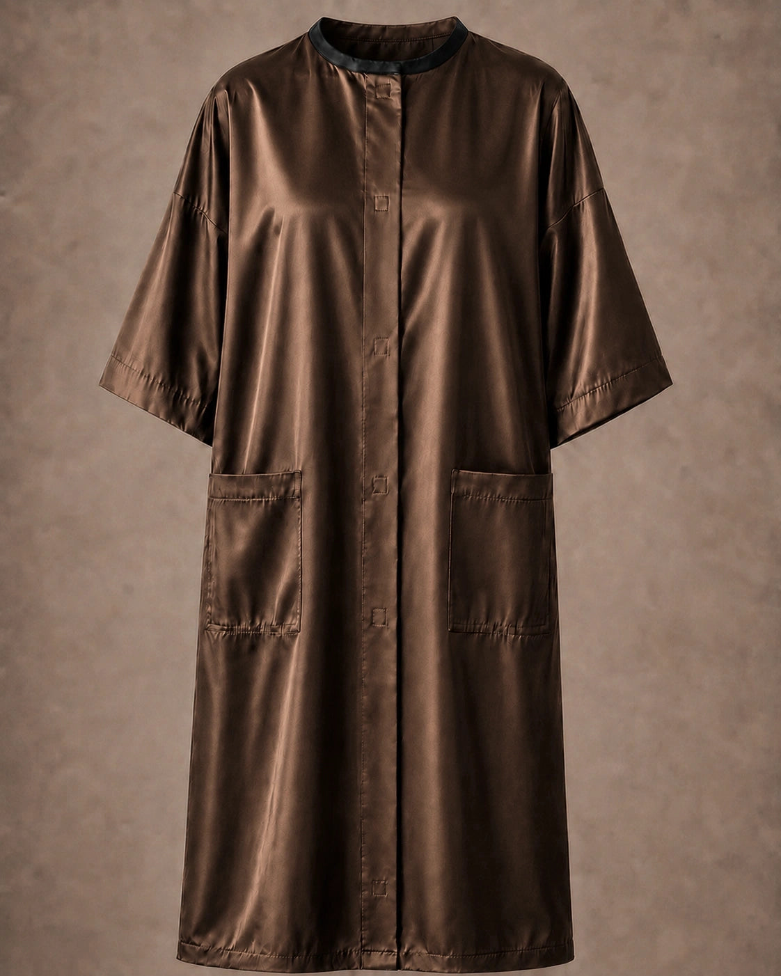 Brown iridescent snap-front salon robe front view with black collar trim, short sleeves and front pockets