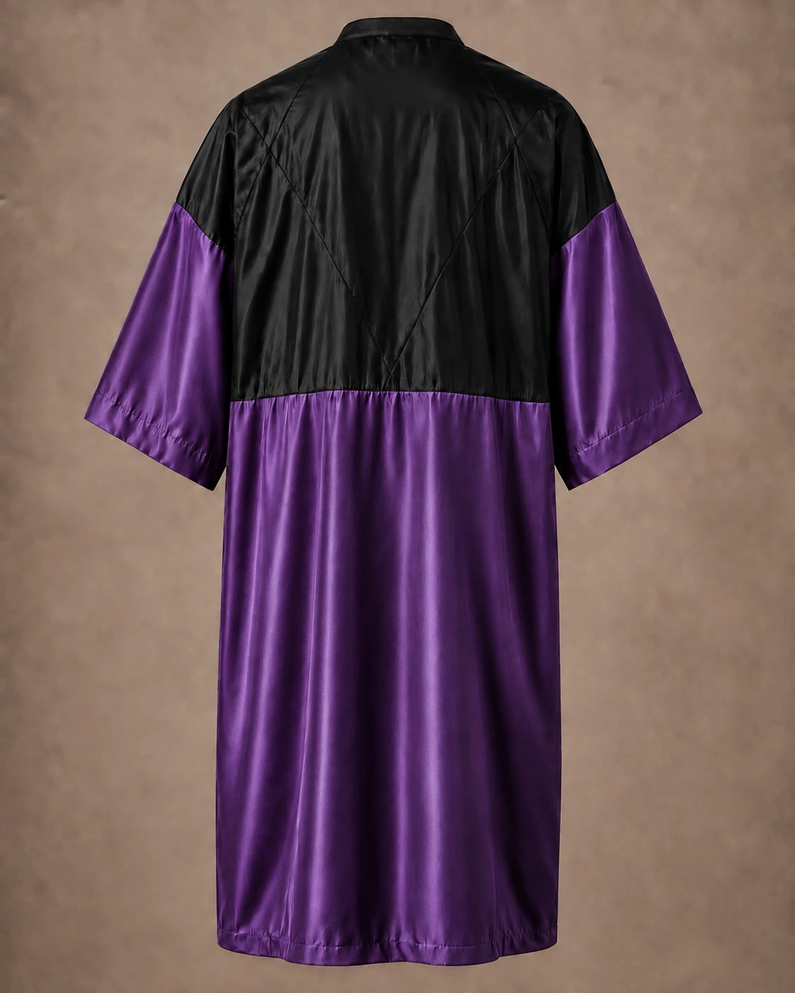 Purple iridescent snap-front salon robe back view with black waterproof upper-back panel