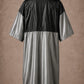 Silver iridescent snap-front salon robe back view with black waterproof upper-back panel