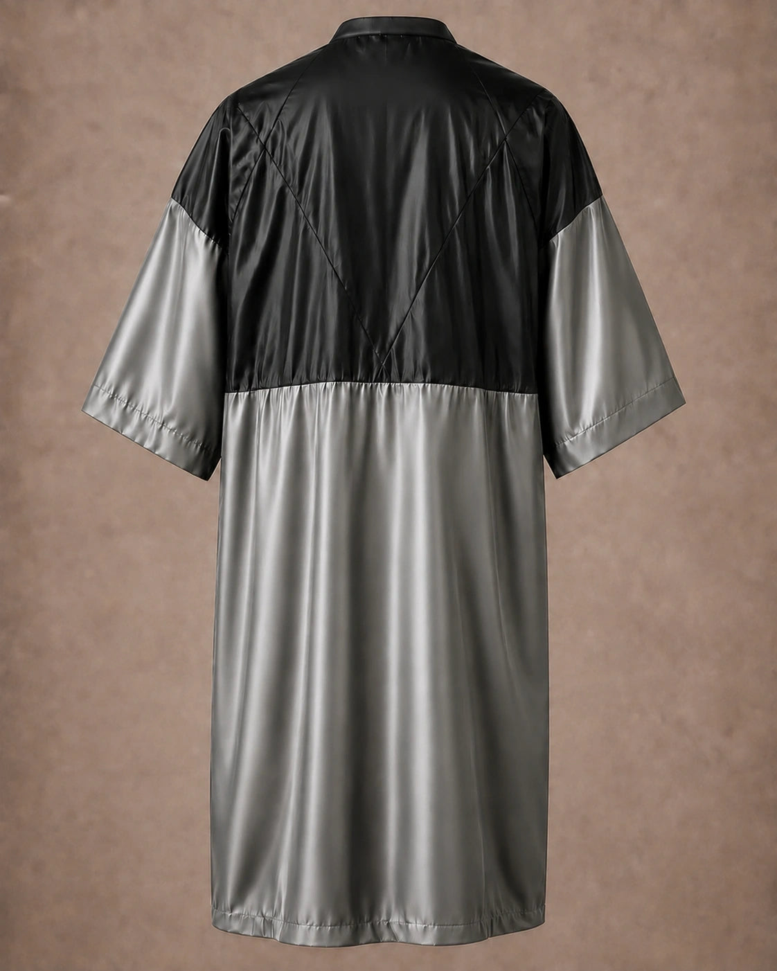 Silver iridescent snap-front salon robe back view with black waterproof upper-back panel