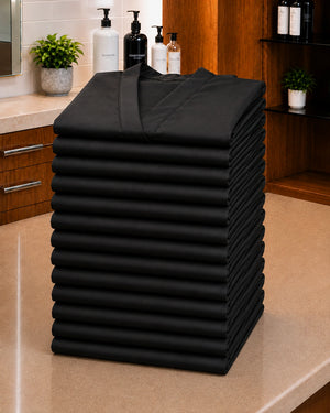 Baker’s Dozen stack of 13 folded Black Crepe Kimono Client Robes