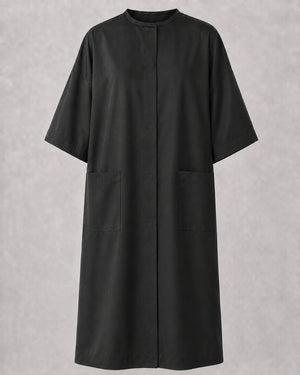 Front view of Black Crepe Snap-Front Client Robe with concealed snap closure and pockets
