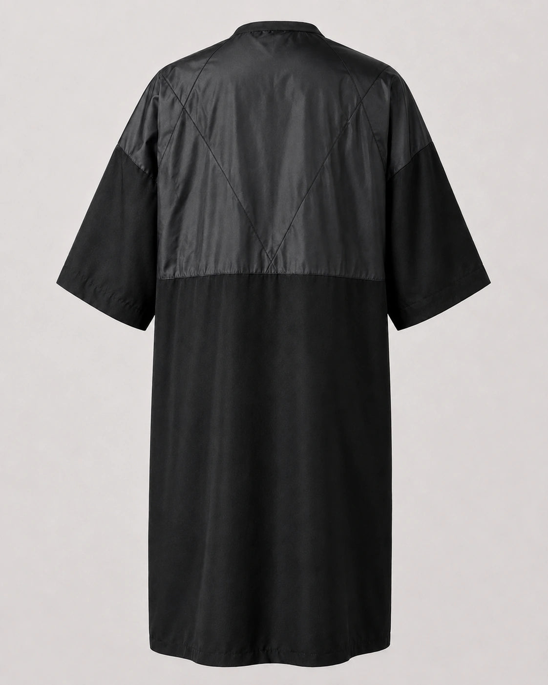 Back view of Black Crepe Snap-Front Client Robe with waterproof upper-back panel