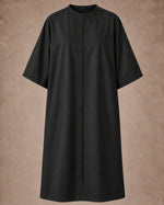 Iridescent black zipper-front salon robe front view with black center zipper