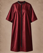 Iridescent burgundy zipper-front salon robe front view with black center zipper