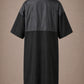 Black iridescent snap-front salon robe back view with black waterproof upper-back panel