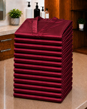 Baker’s Dozen stack of 13 folded Burgundy Iridescent Kimono Client Robes
