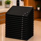 Stack of 13 black SalonCapes crepe cutting capes representing the Baker’s Dozen bulk purchase option