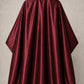 Burgundy iridescent SalonCapes cutting cape front view