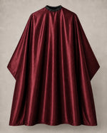 Burgundy iridescent SalonCapes cutting cape front view