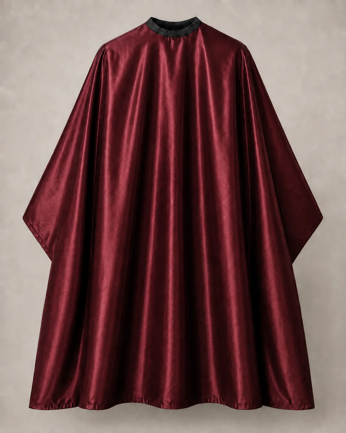 Burgundy iridescent SalonCapes cutting cape front view