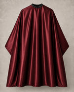 Burgundy iridescent SalonCapes cutting cape front view