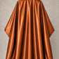 Copper iridescent SalonCapes cutting cape front view