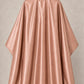 Rose gold iridescent SalonCapes cutting cape front view