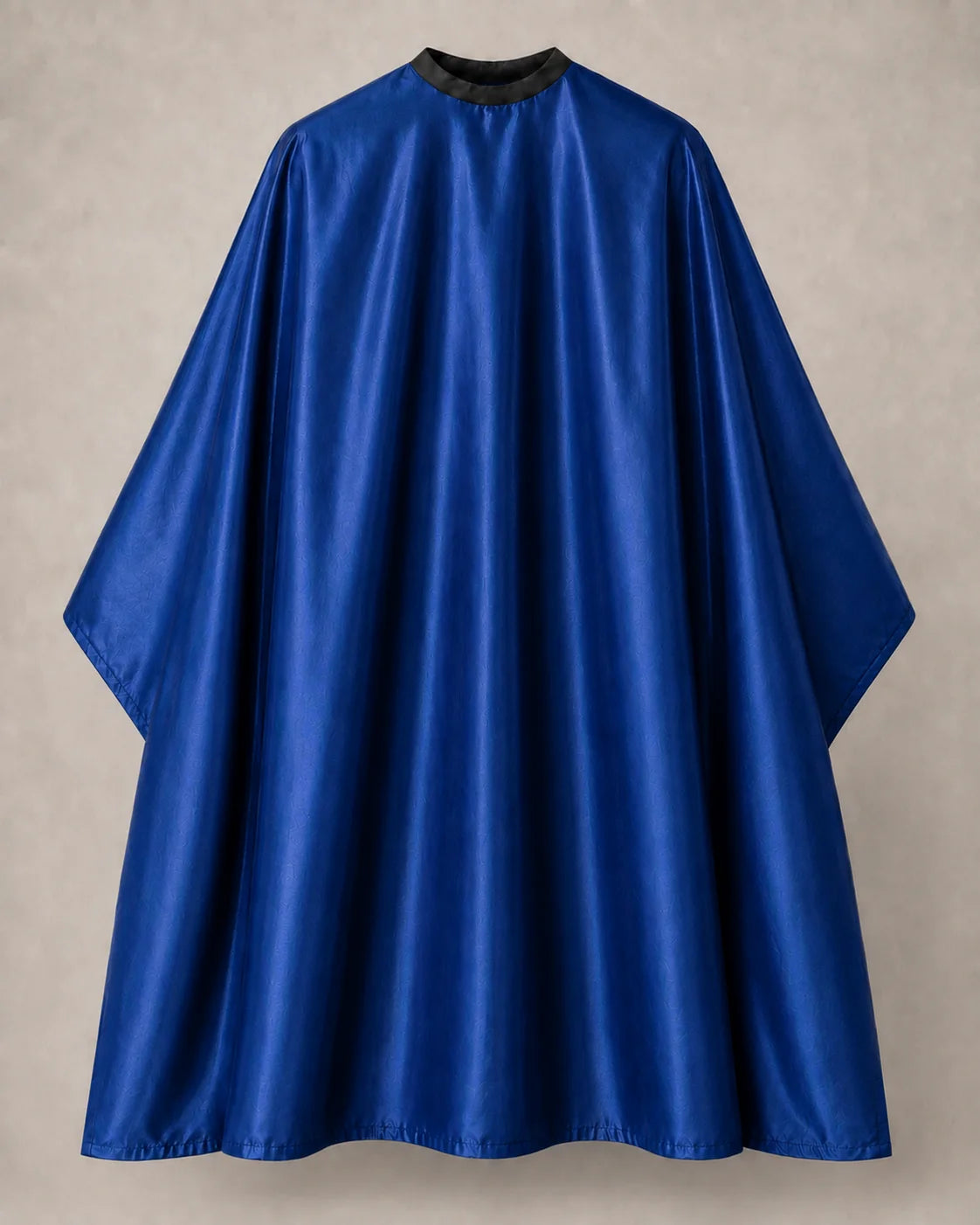 Royal blue iridescent SalonCapes cutting cape front view