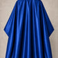 Royal blue iridescent SalonCapes cutting cape front view
