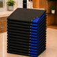 Stack of 13 royal blue and black SalonCapes reversible chemical capes representing the Baker’s Dozen bulk purchase option
