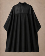 Black-on-black SalonCapes reversible chemical cape front view