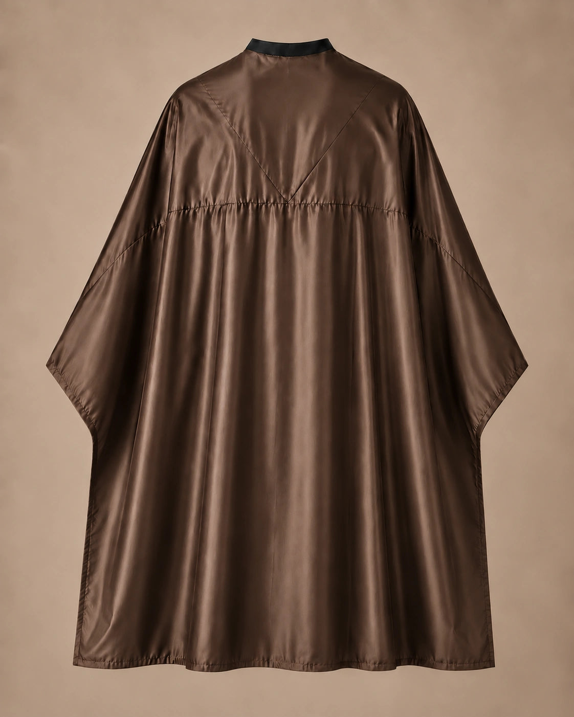 Brown SalonCapes reversible chemical cape back view showing black collar and reversible seam construction