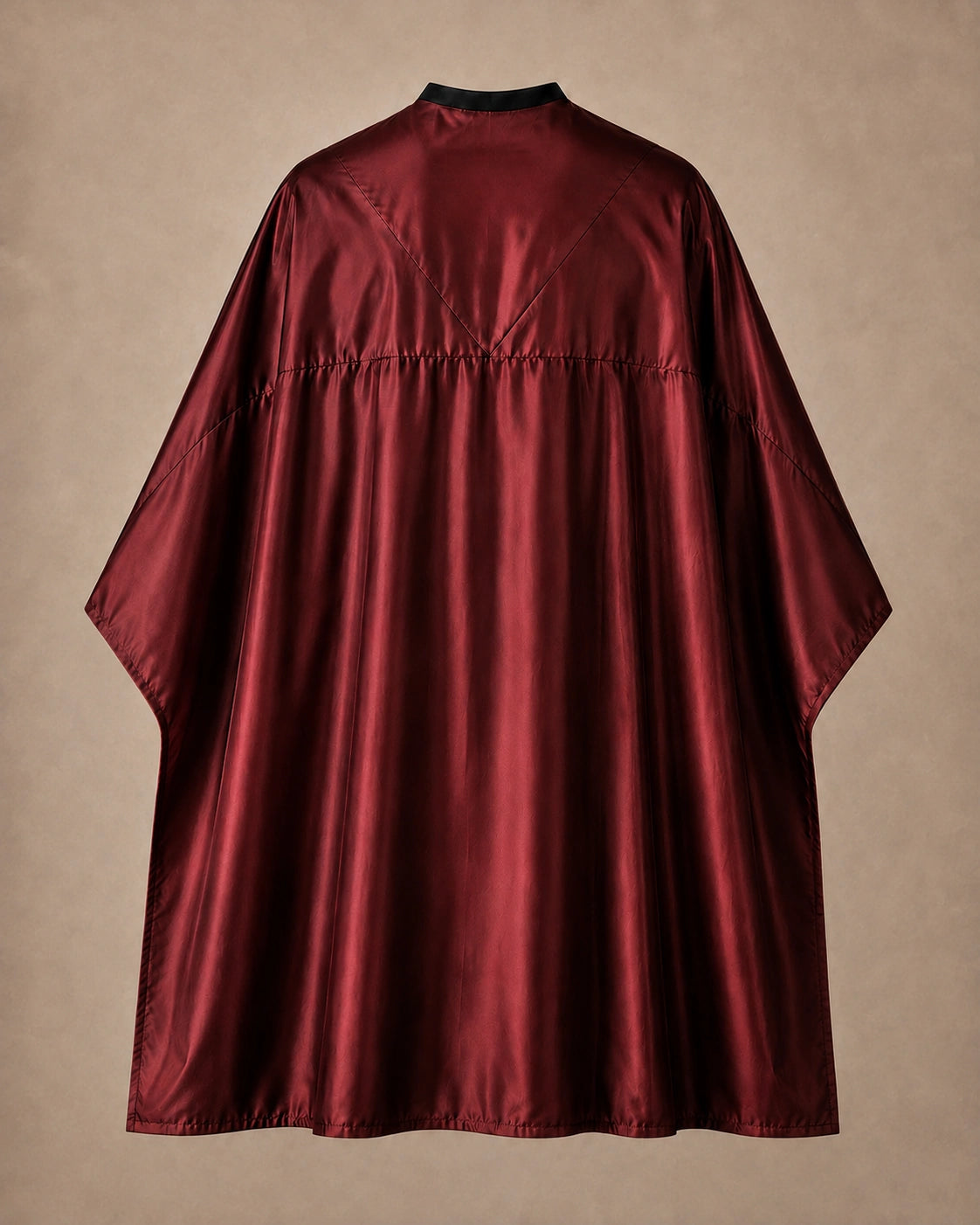 Burgundy SalonCapes reversible chemical cape back view showing black collar and reversible seam construction