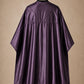Eggplant SalonCapes reversible chemical cape back view showing black collar and reversible seam construction