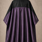Eggplant and black SalonCapes reversible chemical cape front view