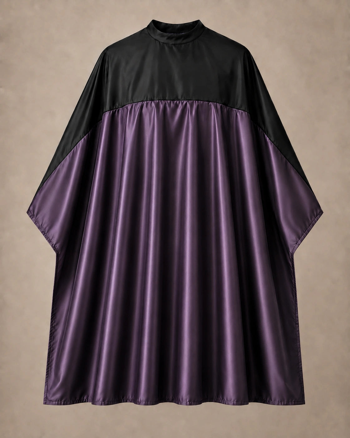 Eggplant and black SalonCapes reversible chemical cape front view