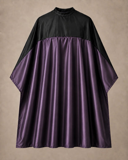 Eggplant and black SalonCapes reversible chemical cape front view