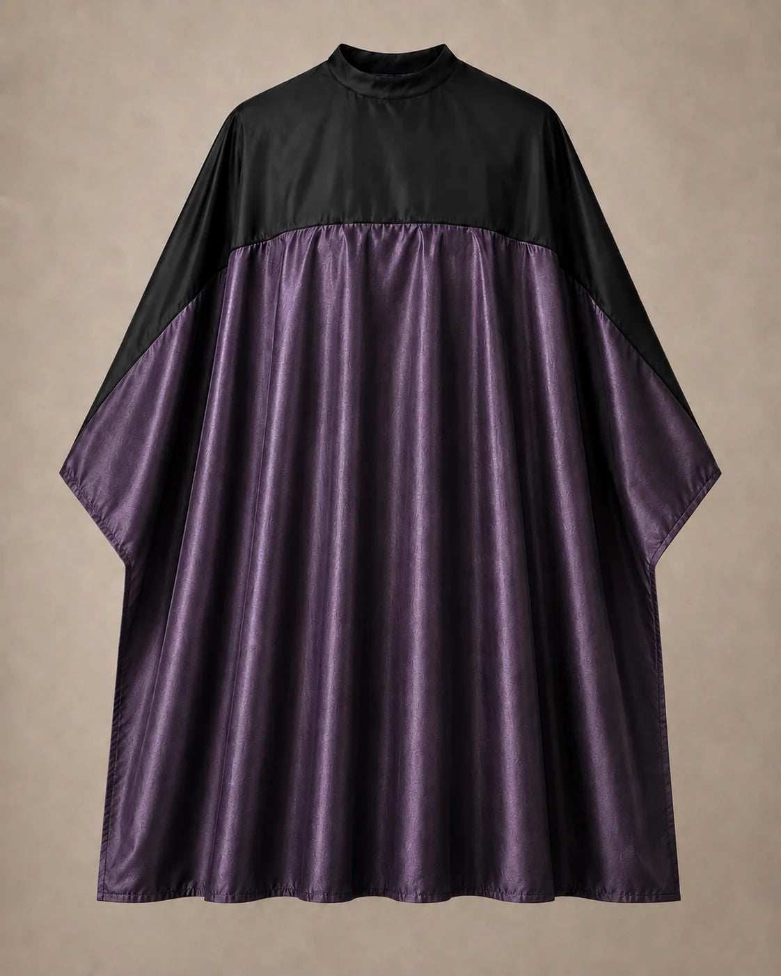 Eggplant and black SalonCapes reversible chemical cape front view