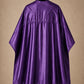 Purple SalonCapes reversible chemical cape back view showing black collar and reversible seam construction