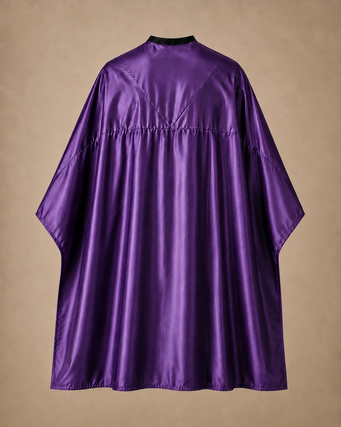 Purple SalonCapes reversible chemical cape back view showing black collar and reversible seam construction