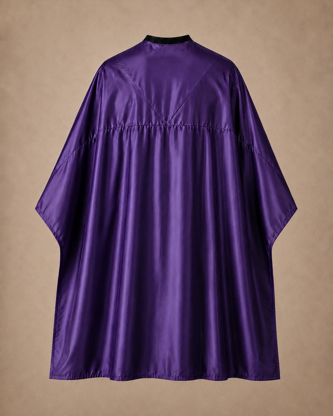Purple SalonCapes reversible chemical cape back view showing black collar and reversible seam construction