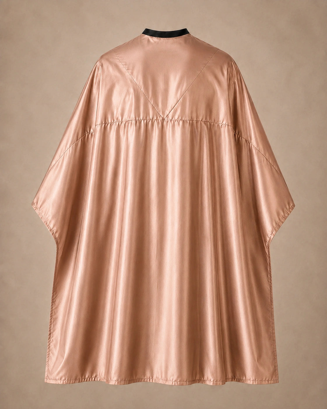 Rose Gold SalonCapes reversible chemical cape back view showing black collar and reversible seam construction