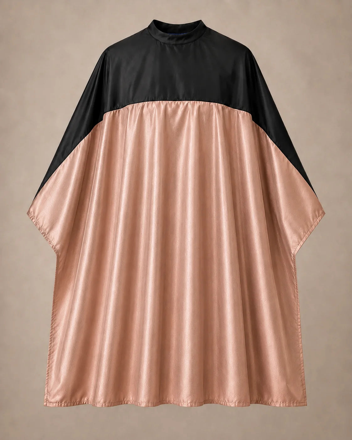 Rose gold and black SalonCapes reversible chemical cape front view