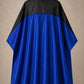 Royal blue and black SalonCapes reversible chemical cape front view