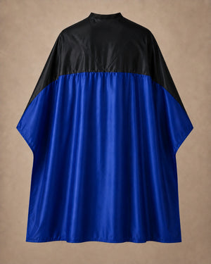 Royal blue and black SalonCapes reversible chemical cape front view