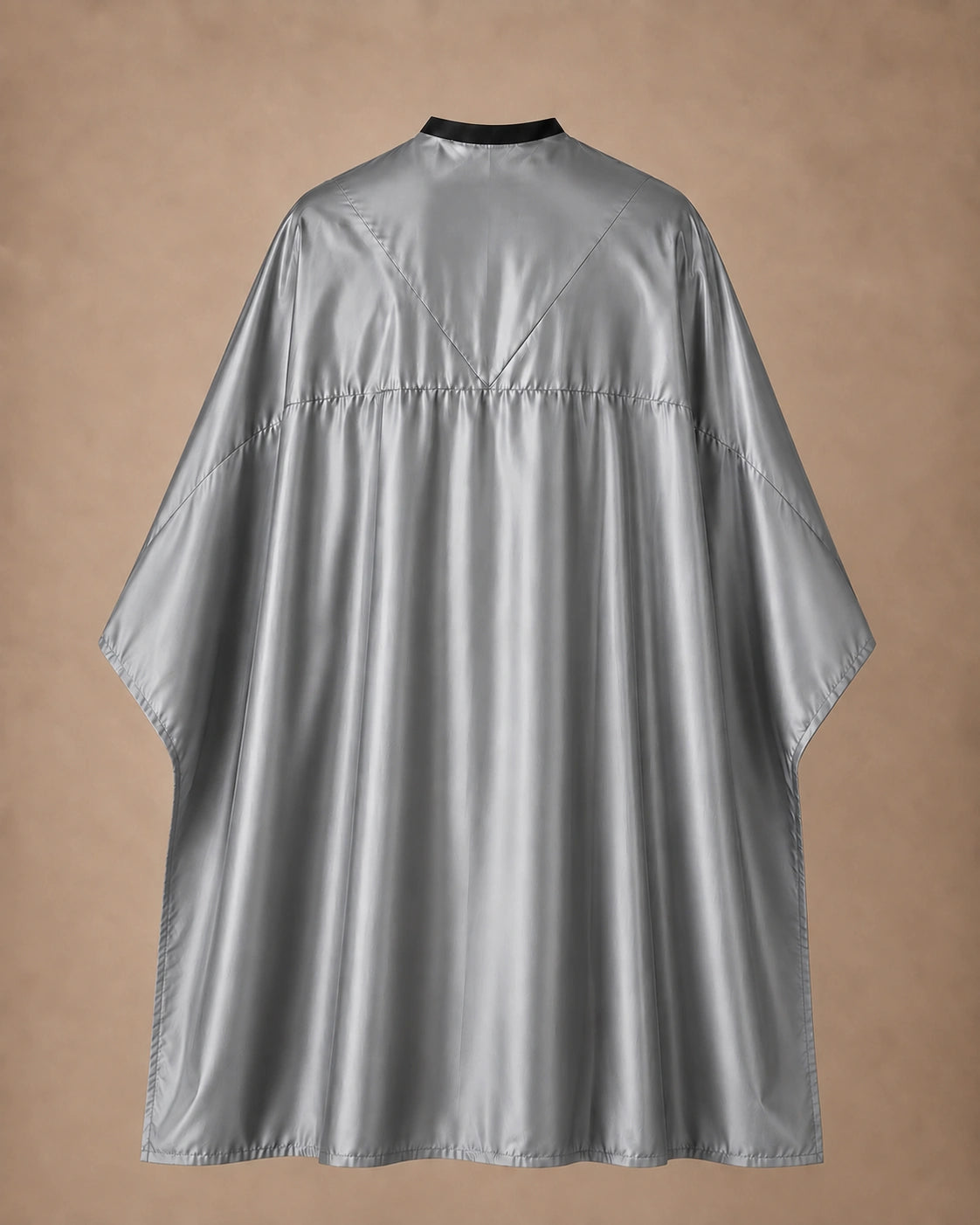 Silver SalonCapes reversible chemical cape back view showing black collar and reversible seam construction